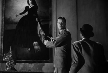 The Ghost Breakers; Larry Lawrence (Bob Hope) finds a portrait which resembles Mary (Paulette Goddard).