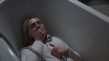 Nutcracker Massacre; Clara (Beatrice Fletcher) cunningly concealed in the bathroom.