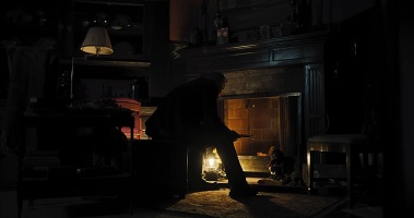 The Apology; unexpected visitor Jack Kingsley (Linus Roache) makes himself at home by the fire.