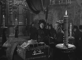 The Queen of Spades; betrayed and cast adrift, Lizavetta Ivanova (Yvonne Mitchell) is comforted at the funeral of the Countess Ranevskaya (Dame Edith Evans).