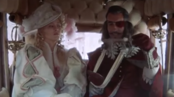 The Three Musketeers; Milady de Winter and the Comte de Rochefort (Faye Dunaway and Christopher Lee), scheming in the back of a carriage.