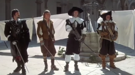 The Three Musketeers; a trio plus one, Athos, d'Artagnan, Aramis and Porthos (Oliver Reed, Michael York, Richard Chamberlain and Frank Finlay) stand loyal to the king.