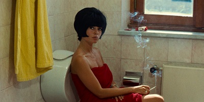 Le Mépris (Contempt); donning a wig to hide her feelings, Camille (Brigitte Bardot) refuses to explain herself.