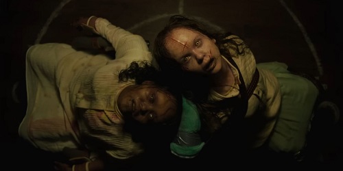 The Exorcist: Believer; Angela and Kat (Lidya Jewett and Olivia O’Neill) are bound for the ritual.