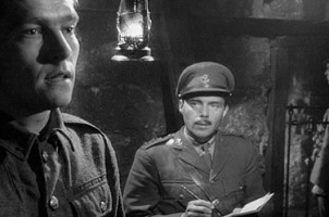 King and Country; Private Arthur James Hamp (Tom Courtenay) recounts his fragmented memories to Captain Charles Hargreaves (Dirk Bogarde).