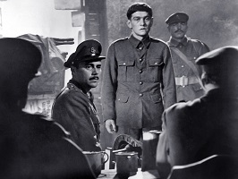 King and Country; Captain Hargreaves (Dirk Bogarde) presents Private Hamp (Tom Courtenay) to the board of investigation.