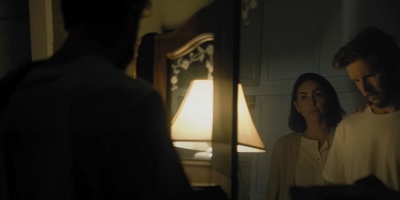 The Portrait; Sofia (Natalia Cordova-Buckley) tries to reach her distant husband Alex (Ryan Kwanten).
